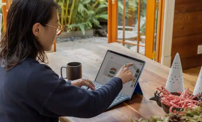 a woman using a laptop