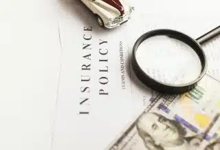 a magnifying glass sitting on top of a piece of paper